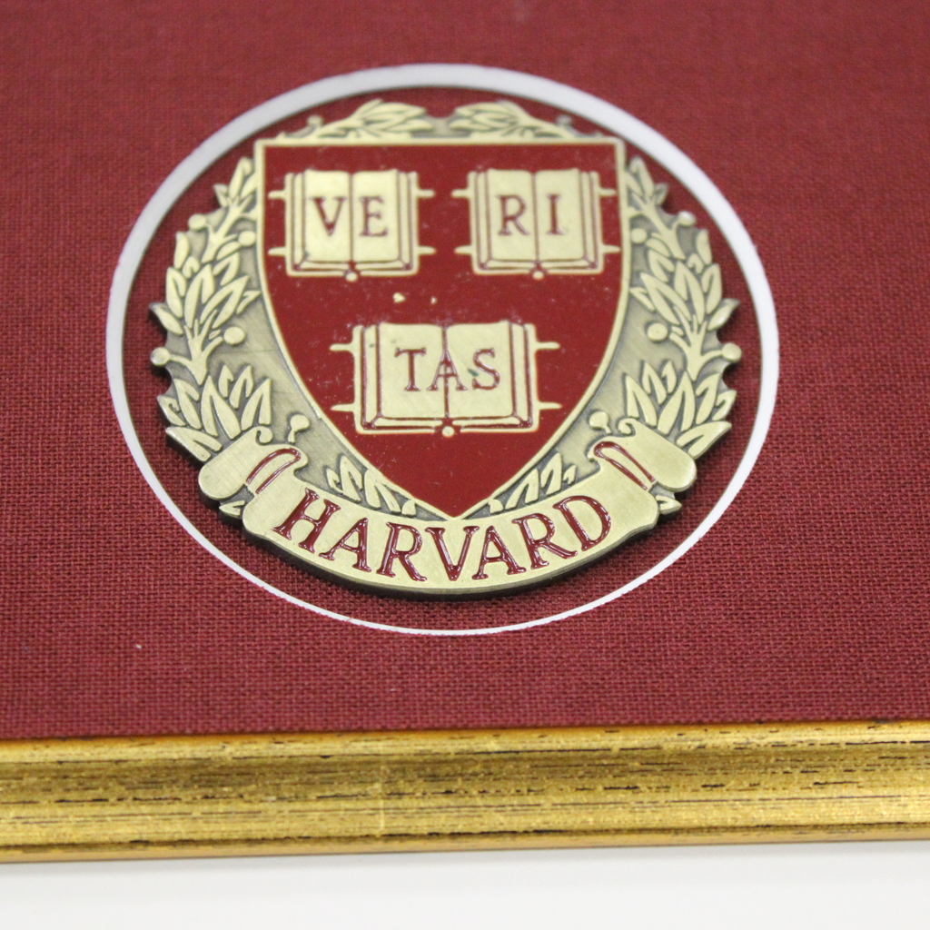 Harvard University logo on diploma frame