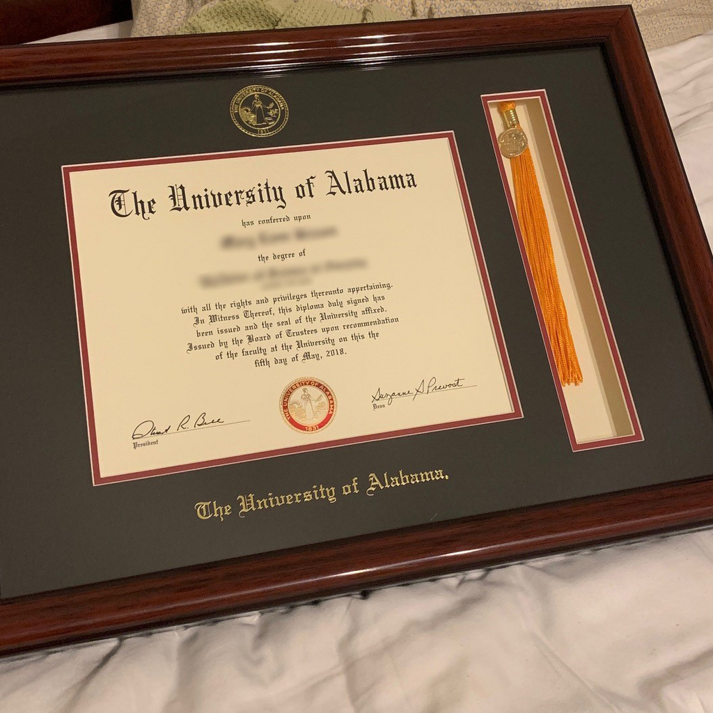 The University of Alabama diploma frame with tassel with navy mat, gold embossed school seal and name