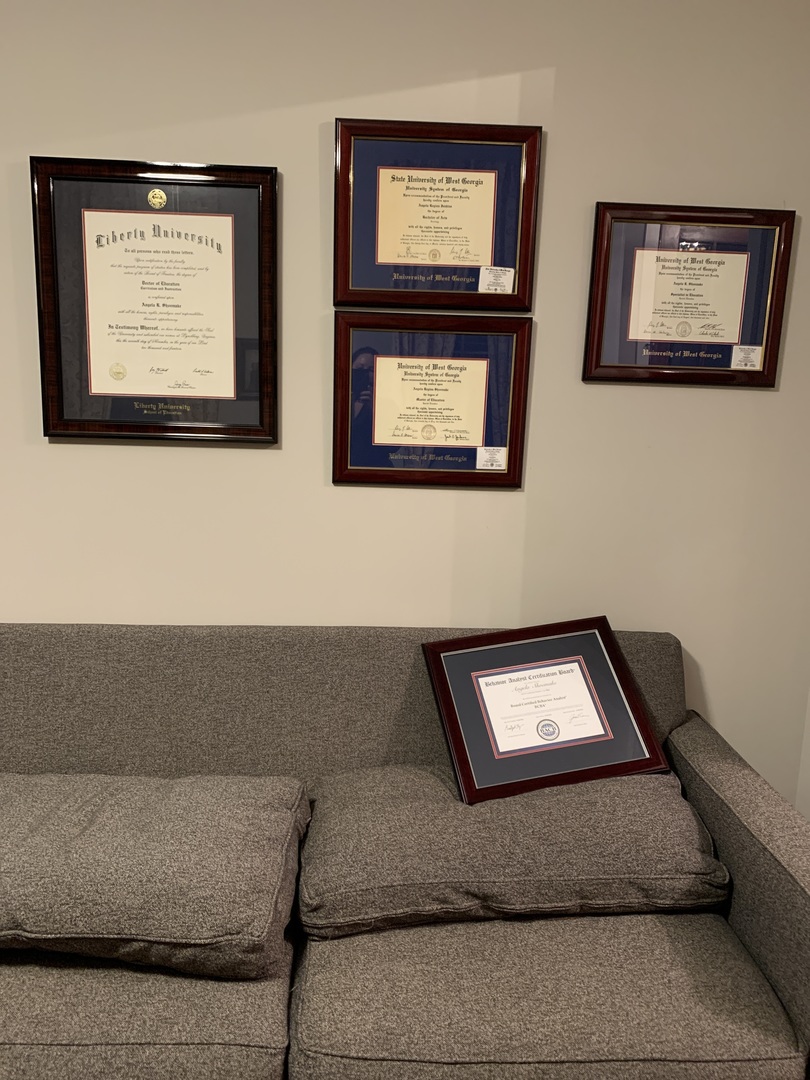 Multiple Diploma Frames on wall