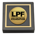 The Loss Prevention Foundation paperweight - Gold Engraved Medallion Paperweight