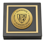 The SUNY Downstate Health Sciences University paperweight  - Gold Engraved Medallion Paperweight